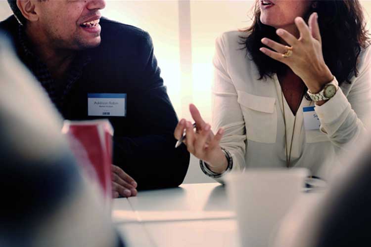 People having a discussion in a meeting