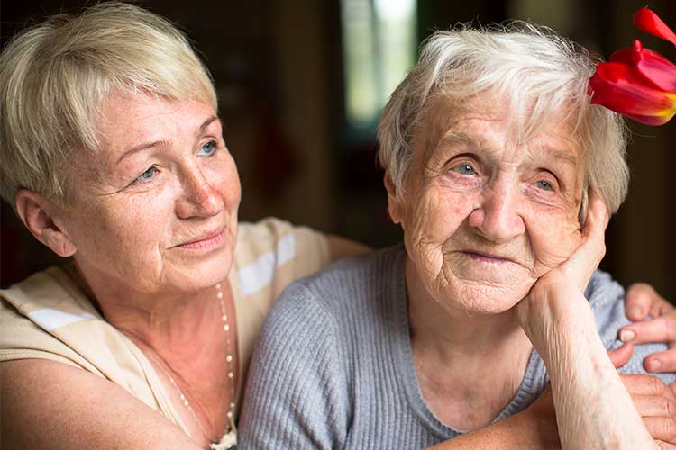 Woman hugging her mother