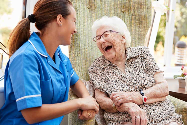 nurse listening to patient