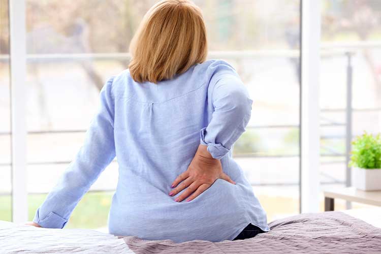 back pain symptom osteoporosis