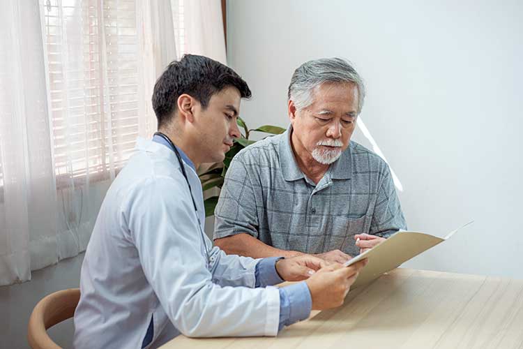 care staff explaining document to client