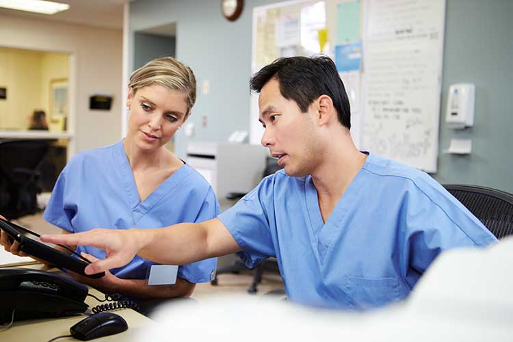 nurses discussing their practice