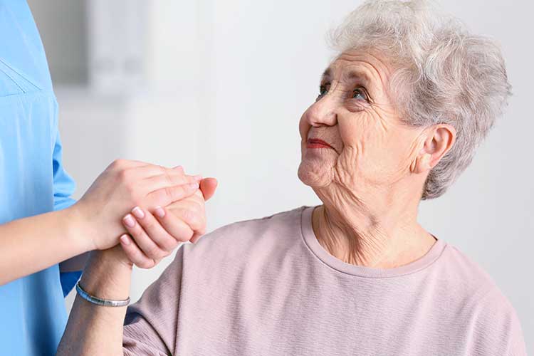 nurse practising empathetic listening with a client