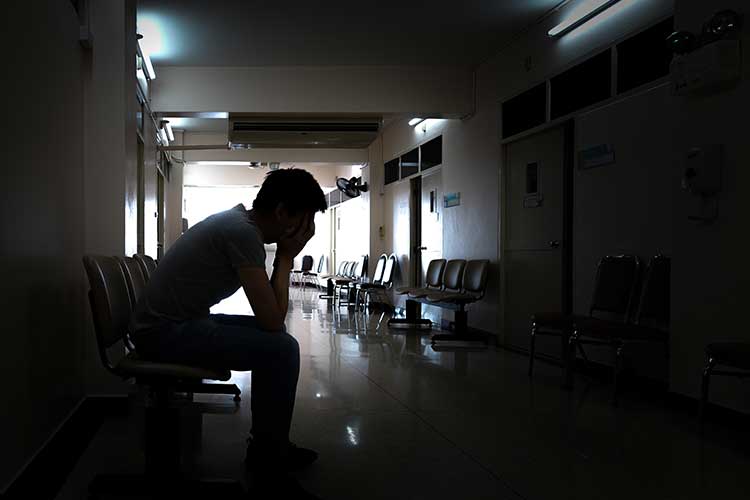 distressed family memeber in  hospital waiting room