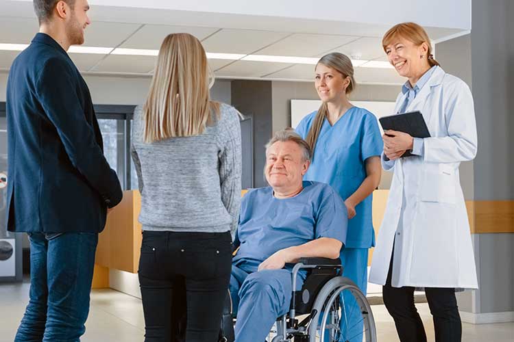 nurse talking to patient's family