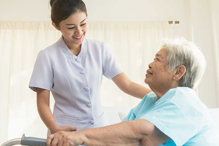 nurse caring for patient
